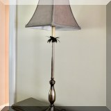 D19. One of a pair of metal table lamps. 